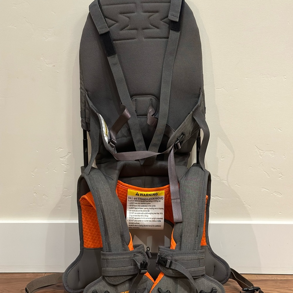 Excellent condition. Never used. Folds into a compact backpack. Grey.